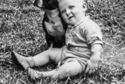 Paul on lawn in front of the 26th street housecirca 1939