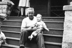Paul Angell and son Bob on the front steps of the Dorchesteer house, circa 1944.