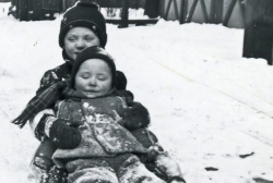 Sledding in the alley behind 4905 Dorchester, Chicago circa 1943