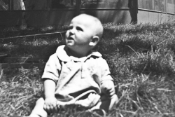 Paul Jr. in front of girls tent. Lake Geneva 1940